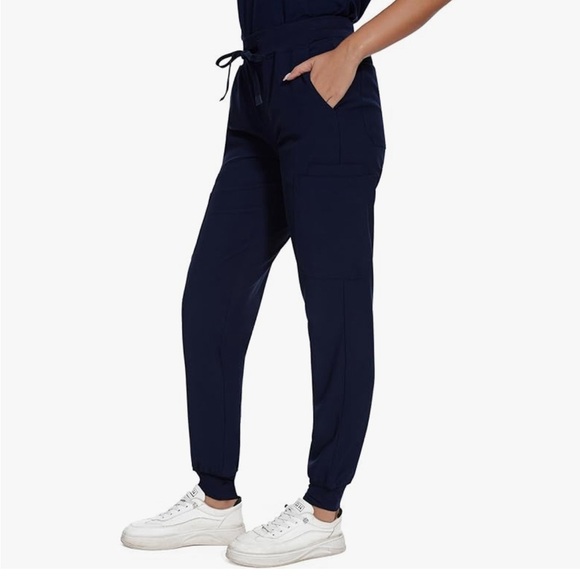 NWT- UNISEX SCRUB PANTS 
MSRP$42
BEAUTIFUL SOFT
SILK LIKE MATERIAL - Picture 1 of 8